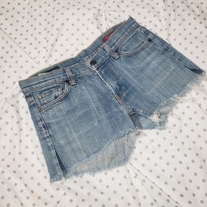 Distressed denim shorts
